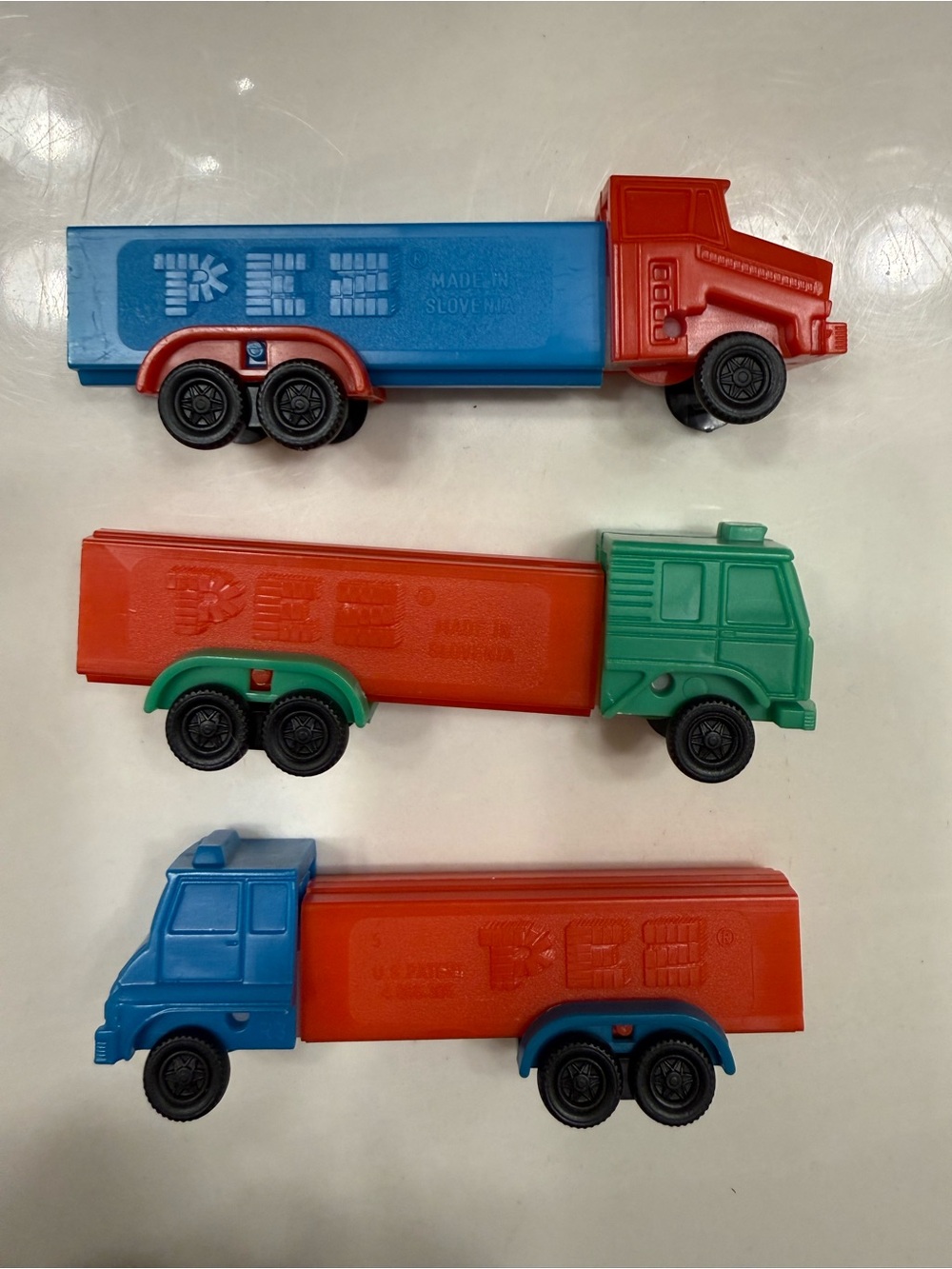 3 Pez Kids Toy Truck Set - Red, Blue & Green